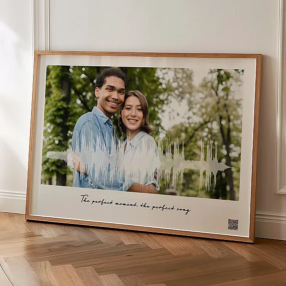 framed soundwave art with couple photo and waveform design displayed in home interior